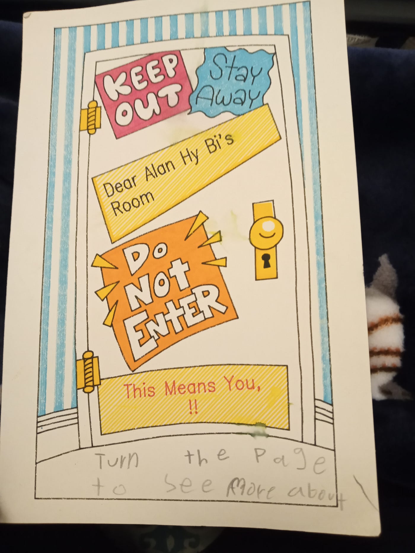 A birthday card with the picture of a door that has a sign “Do Not Enter”