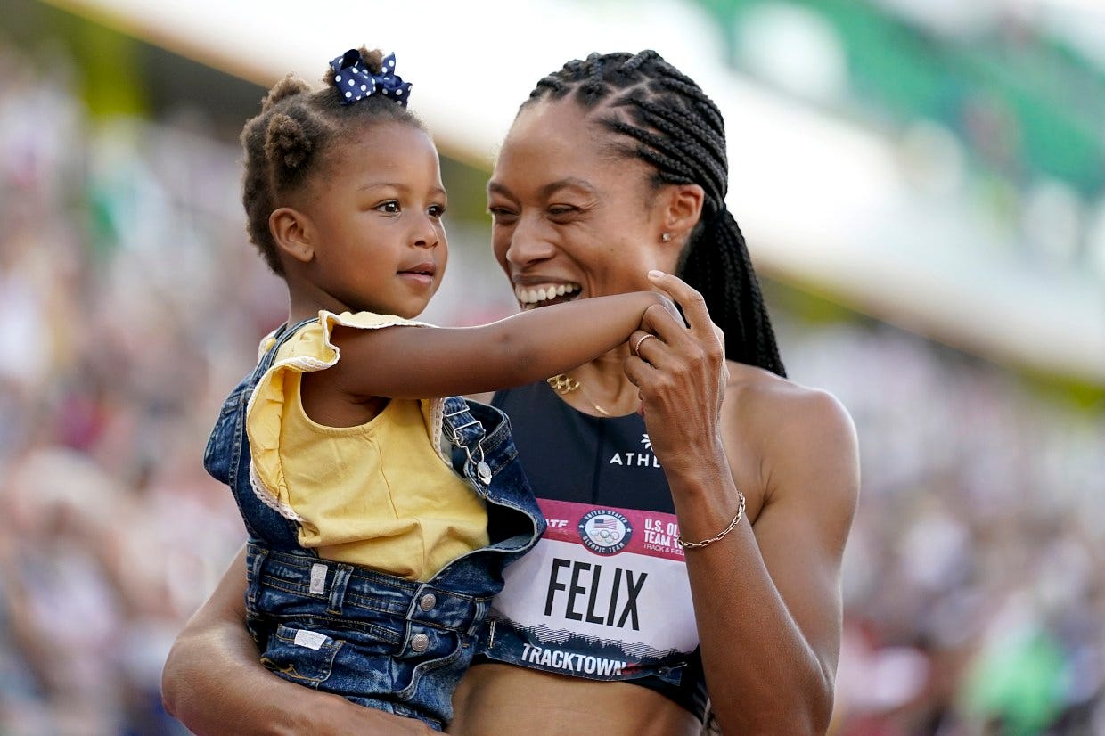 Allyson Felix celebrates qualifying for the Olympics with two-year-old daughter Camryn