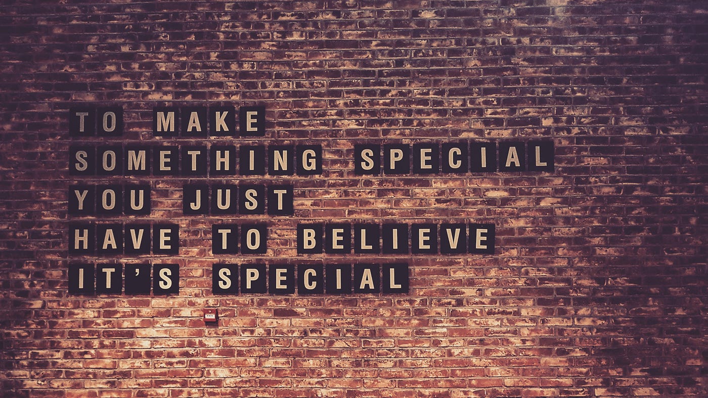 Image of a wall with letters stuck to it reading: “To make something special you just have to beleive it’s special”