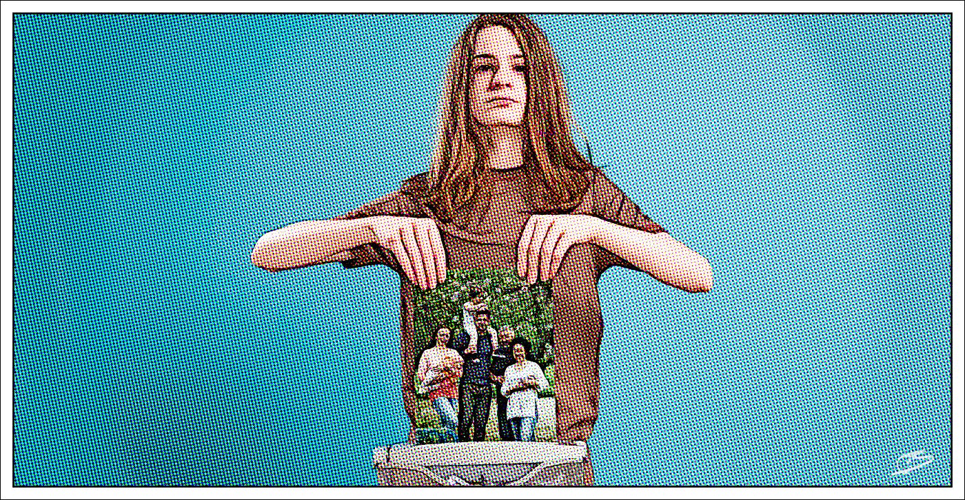 Boy feeds family photo to shredder