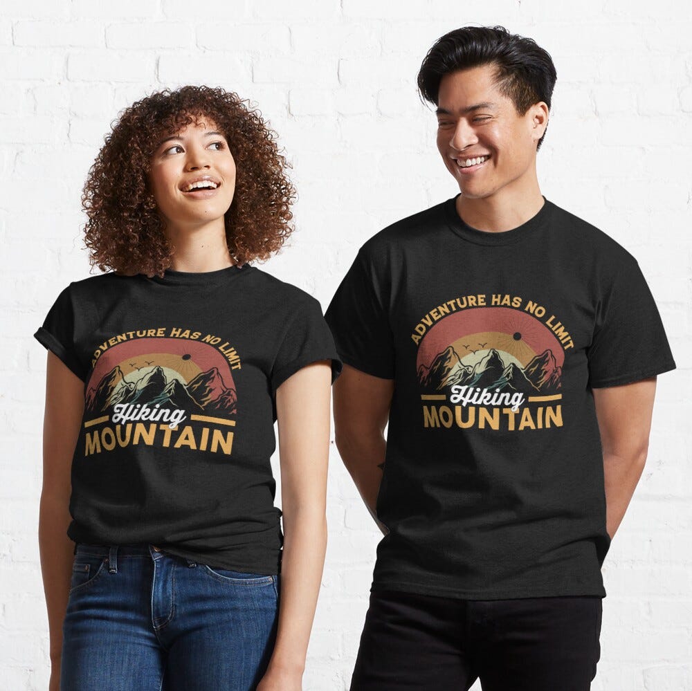Man and Woman Wearing a black classic t-shirt with amazing illustration and text saying “adventure has no limit mountain hiking”.