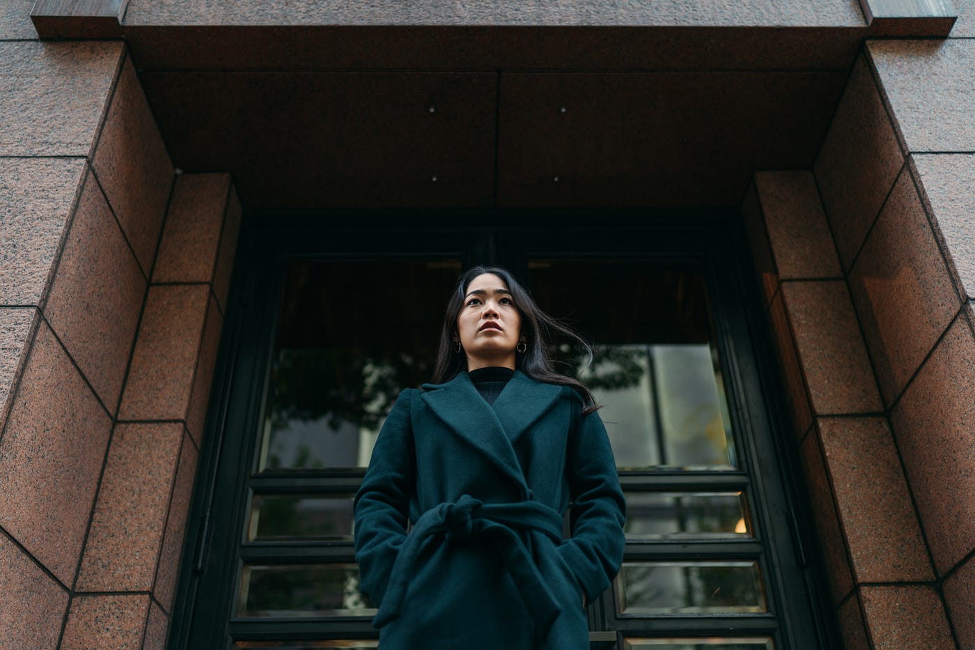 A photo of a young, Asian woman in winter clothes
