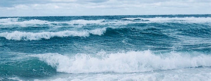 Cold Blue Ocean Waves Rolling Offshore.