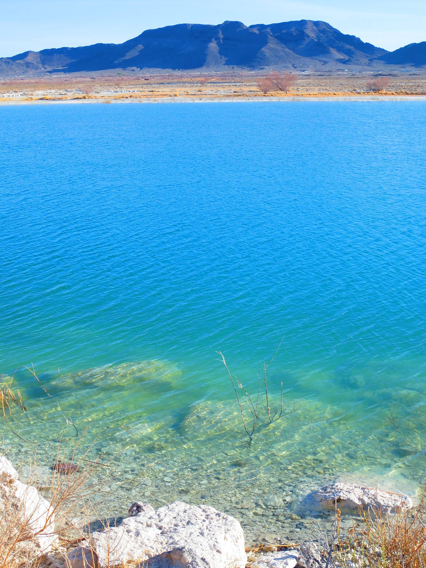 a lake featuring crystal blue water