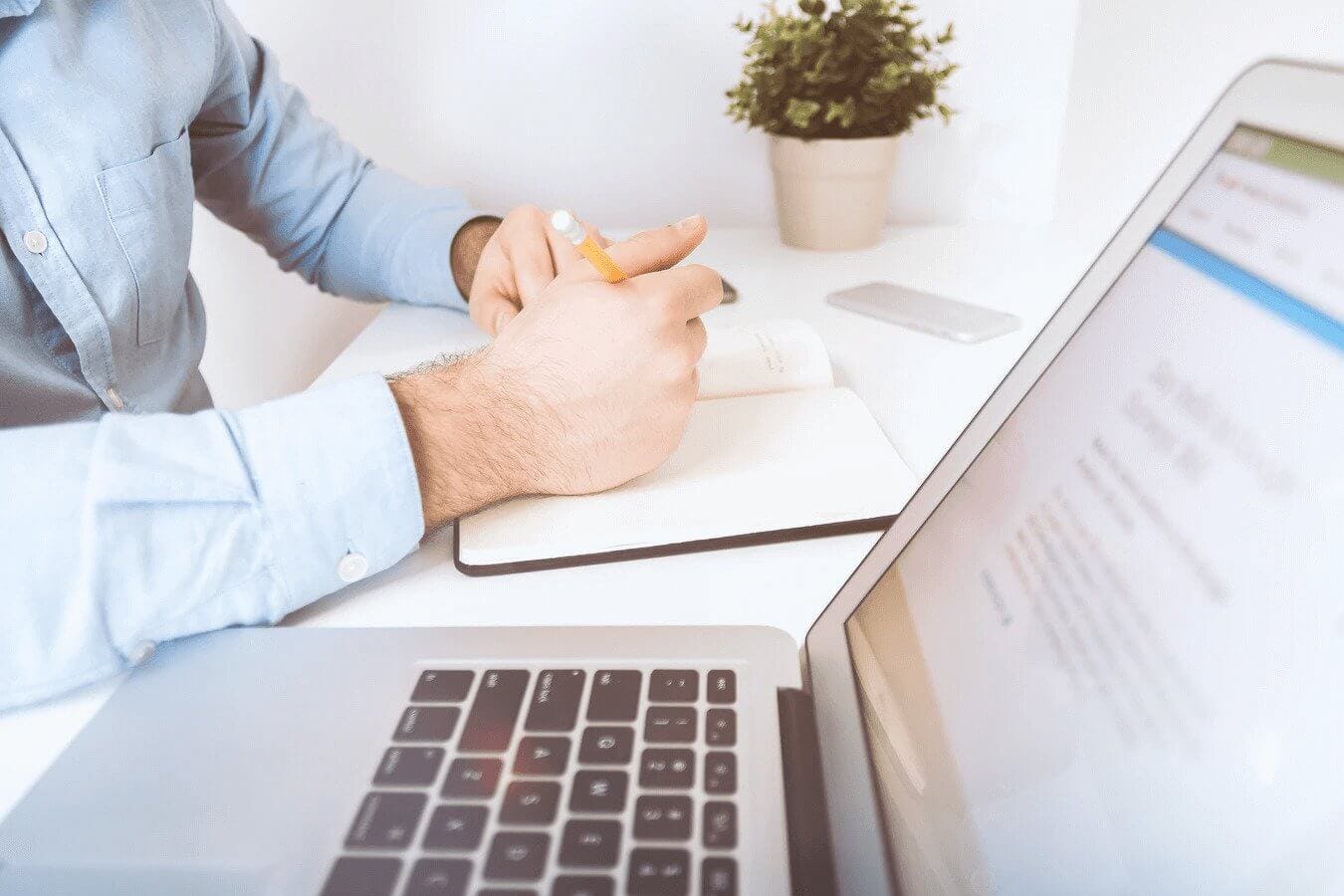 Business person taking notes