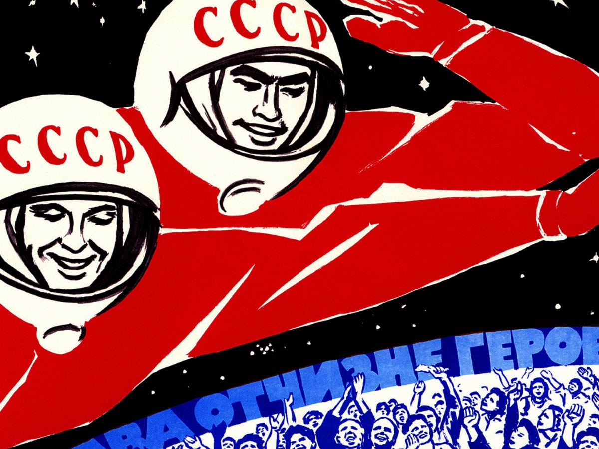 Two giant astronauts in red suits with helmets that say “SSSR” in Russian, looking down and saluting at a planet of celebrating people