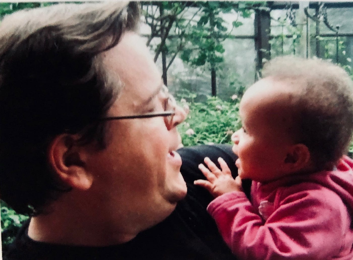 A photo of the author holding his baby daughter.