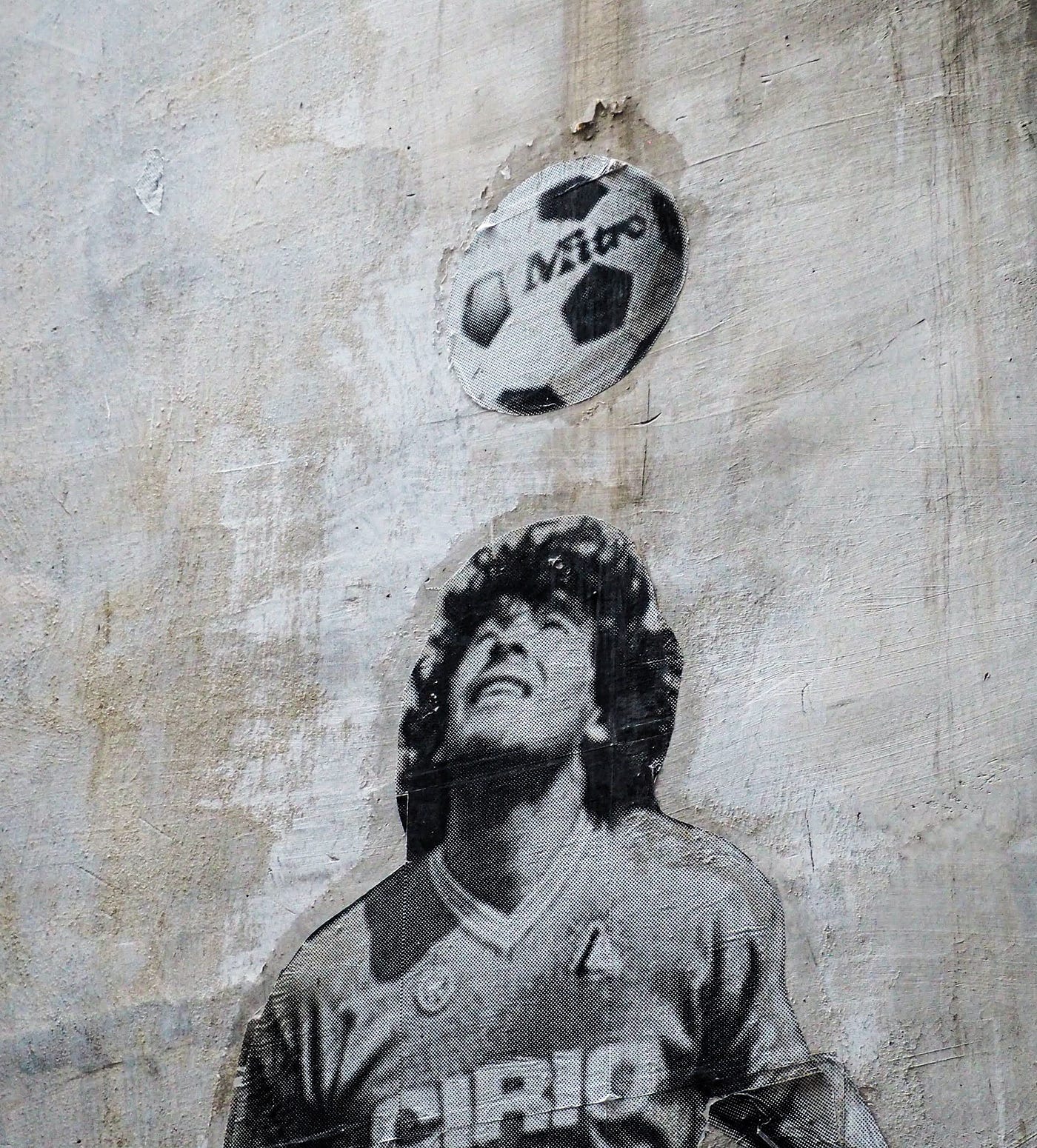 A mural with Diego Maradona balancing a football on his head.