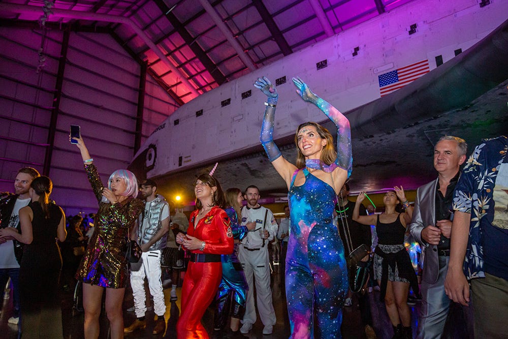 People dancing at the Yuri’s Night event.
