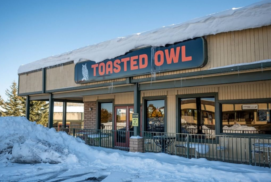 The Toasted Owl Cafe eastside location covered in snow in Flagstaff, AZ