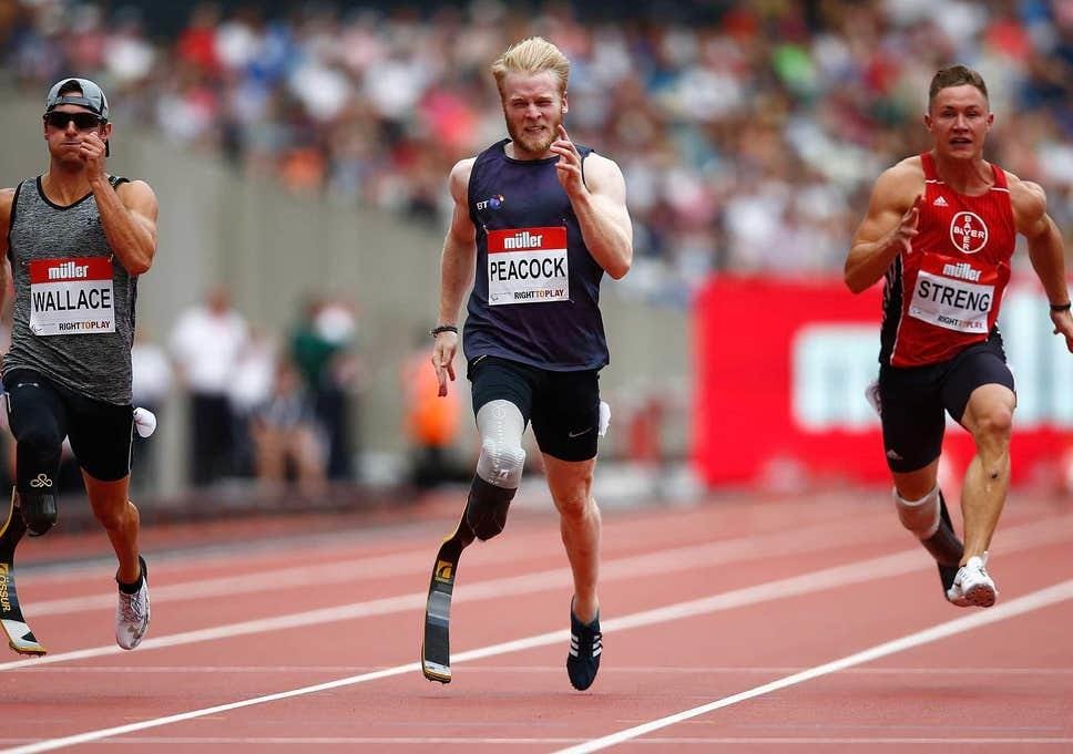 Blond man with a prosthetic limb running.