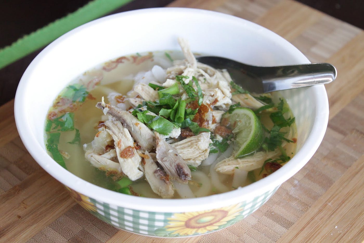 Unique to Laos' cuisine, Khao Piak Sen is just chicken or pork broth, ...