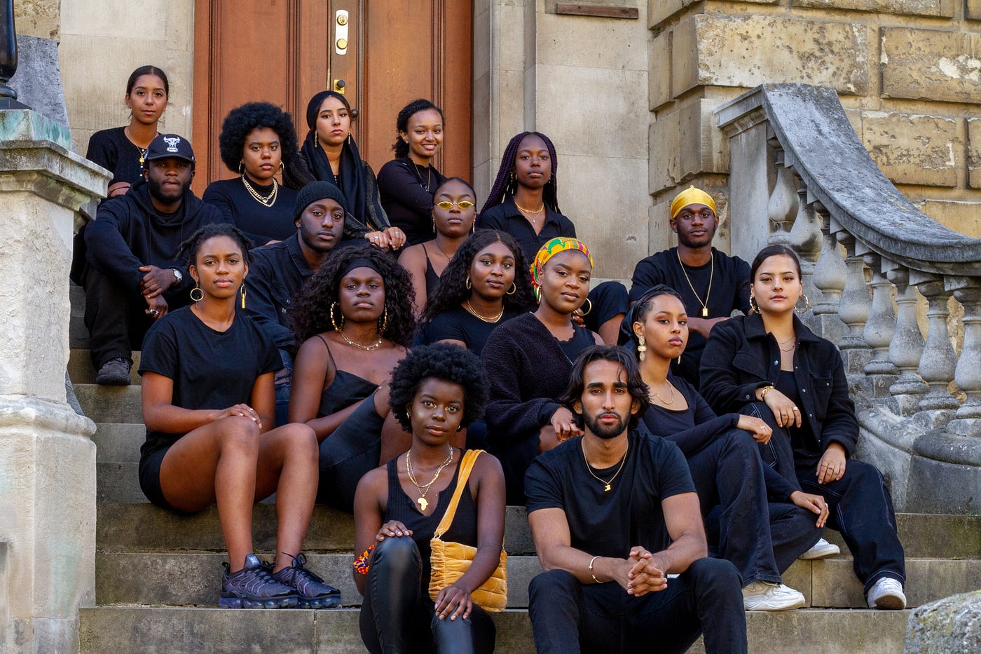 Students from the ACS sit on the steps of the Radcliffe Camera