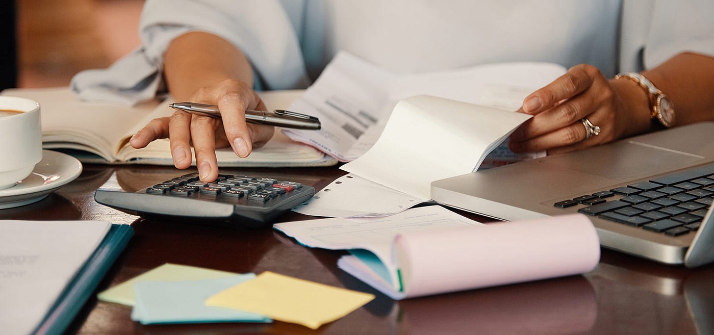 Business person paying bills