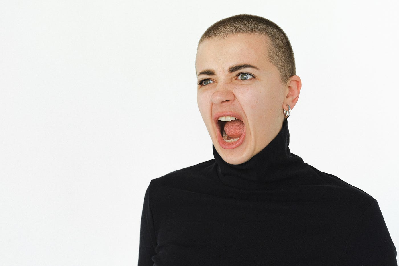 Woman In Black Turtleneck Shirt Yelling