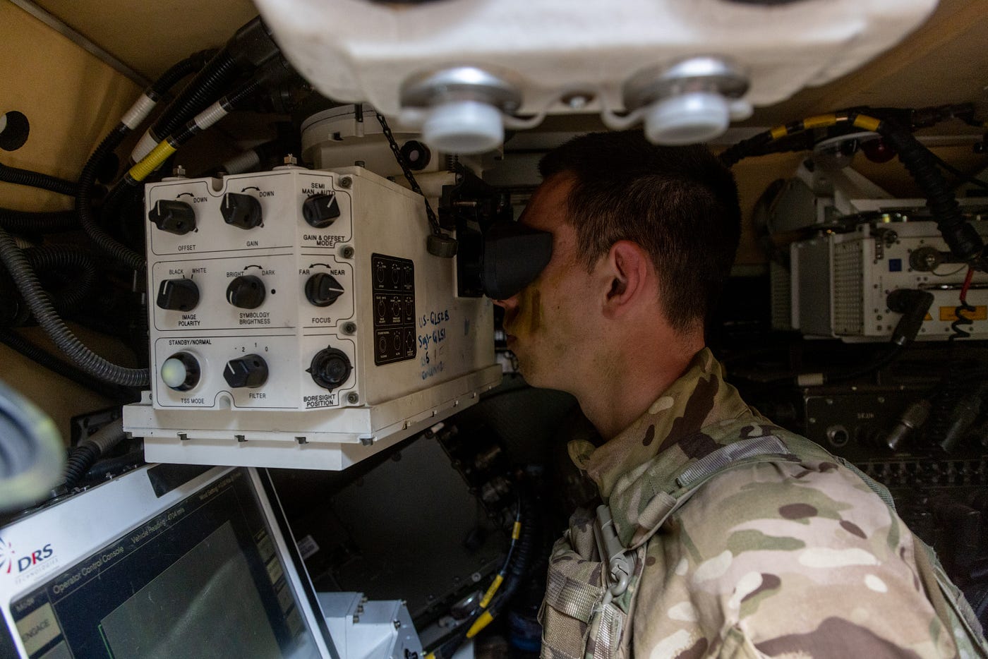 UK soldier looks out from inside a Stormer, the platform for the Starstreak High Velocity Missile system