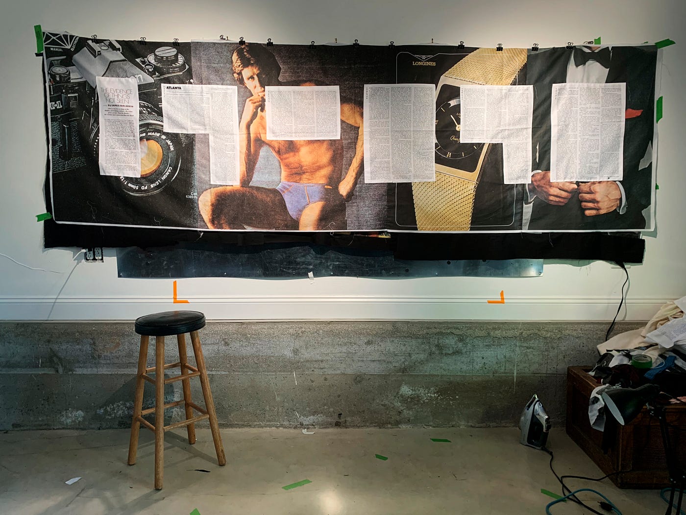 An in-progress photographic quilt hangs on the wall in Carolyn Drake’s studio.
