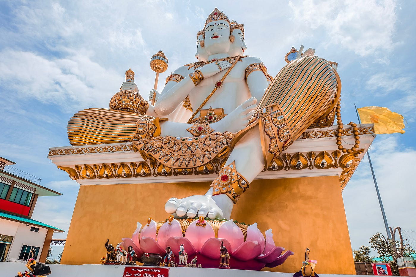 Three headed Buddha statue