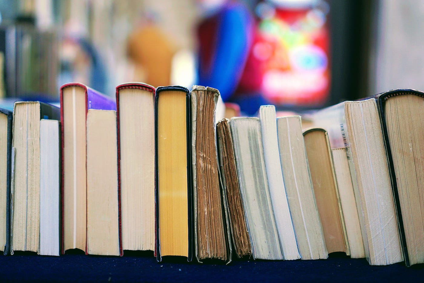 a row of books, with the bottom edge visible