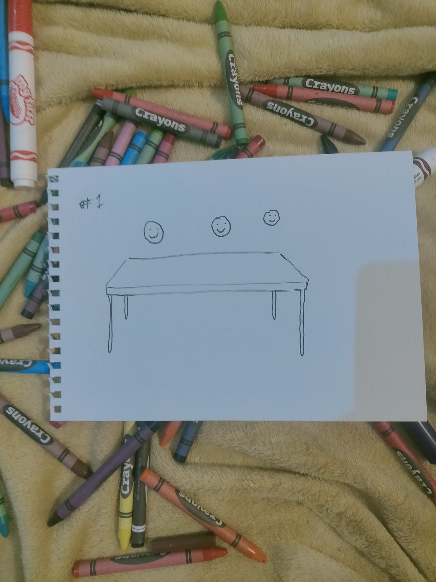 Death playing with his son’s crayons
