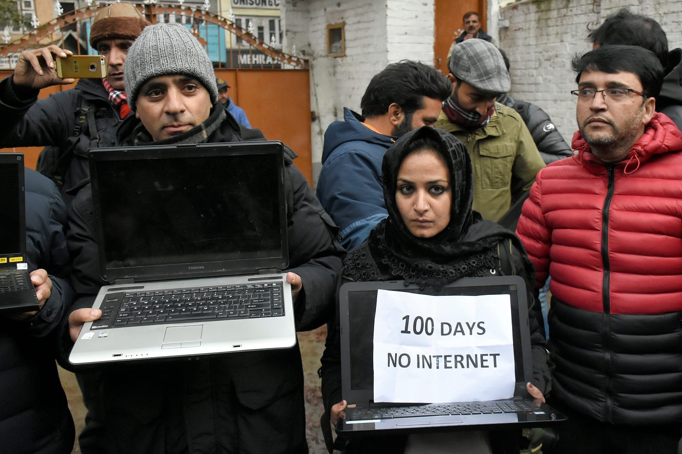Kashmiri journalists protest against the continuous internet blockade for the 100th day outside of the Kashmir press club.