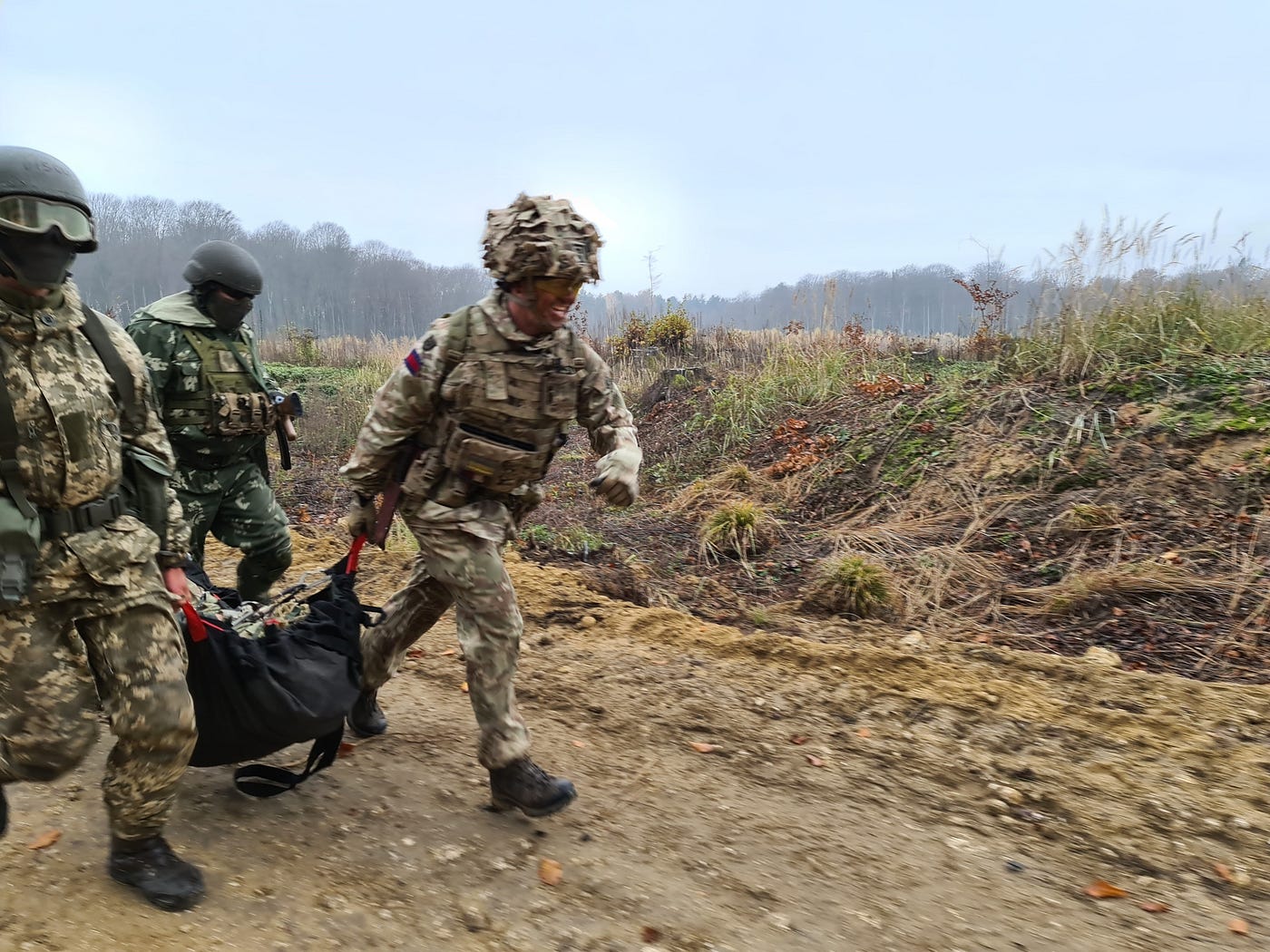 Ukrainian and British soldiers in a Battle Exercise scripted to involve a Ukrainian Recce callsign.
