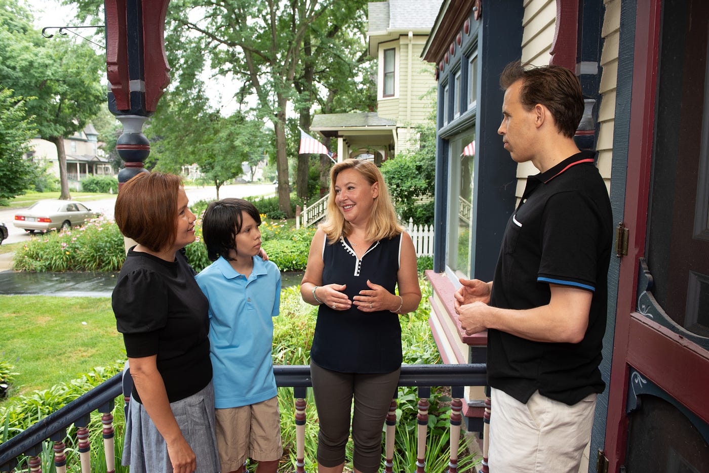 IL State Rep Anna Moeller (center) engaging with residents.
