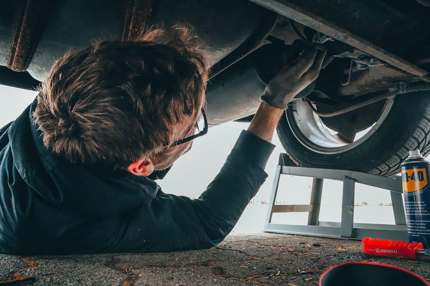 A mechanic fixing the chassis of a vehicle (metaphor: the vehicle is your body). Mic drop.