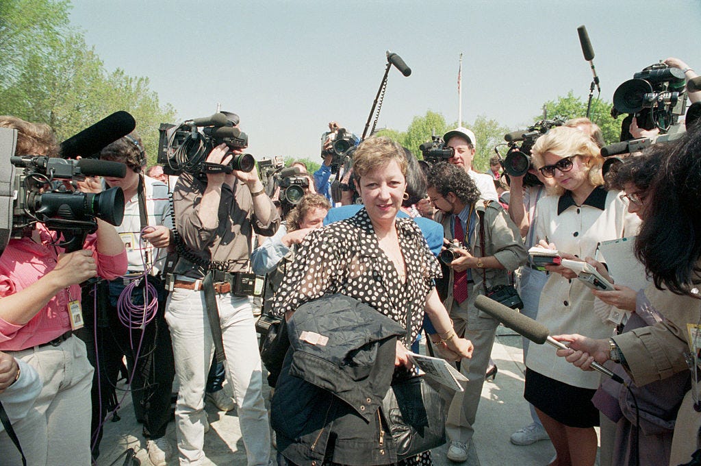 Photo shows McCorvey in front of Supreme Court steps talking to the press in 1989.