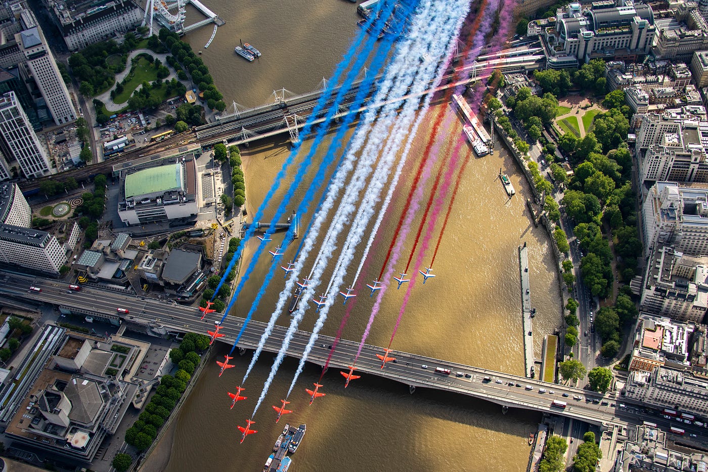 An image of the Red Arrows flying over the River Thames in London.