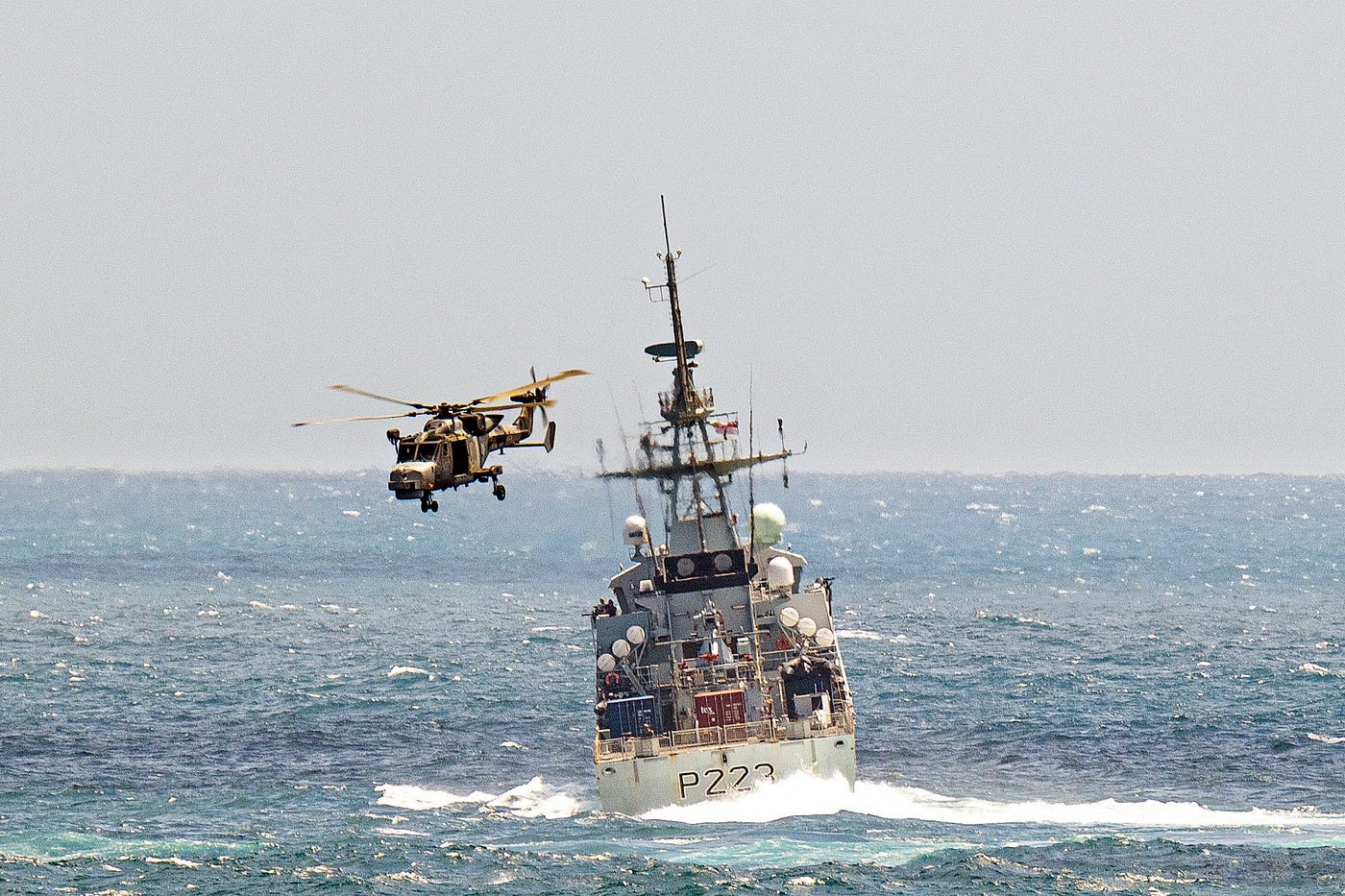 HMS Medway exercises with a Knightrider Wildcat helicopter.