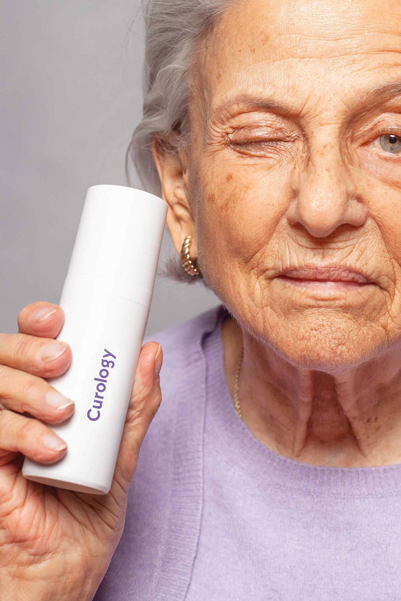 Woman holding anti-ageing secret formula