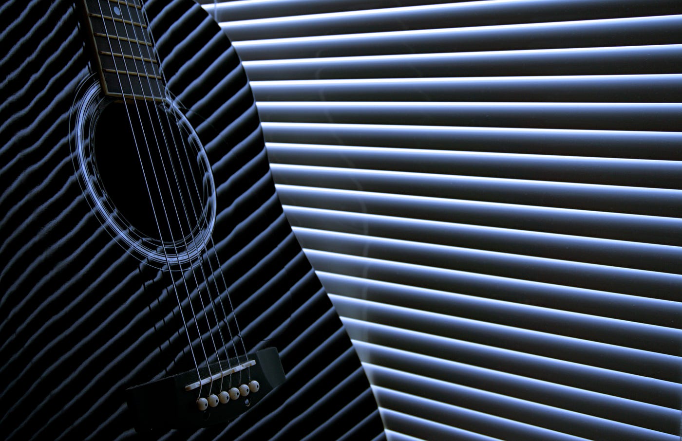 8 Most Essential SciPy Functions for Linear Algebra 1 A guitar against light reflection, which is giving off linear lines