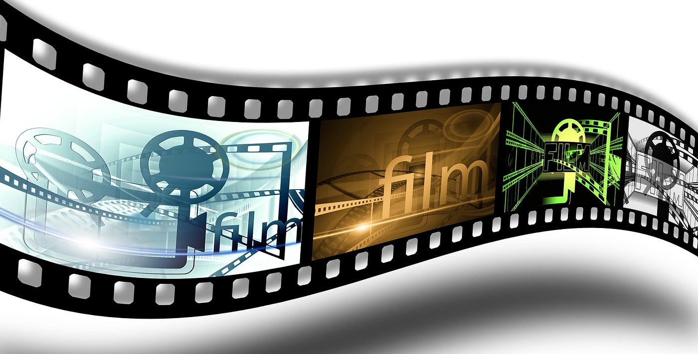 A strip of celluloid film with movie images on it