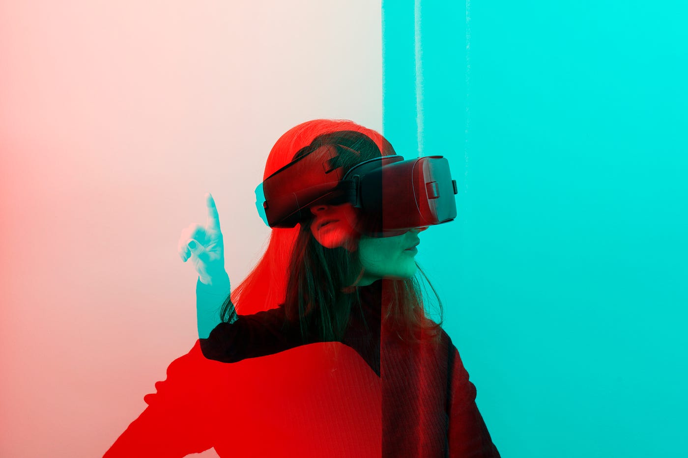A double exposure photograph of a woman wearing VR Glasses in two different poses.