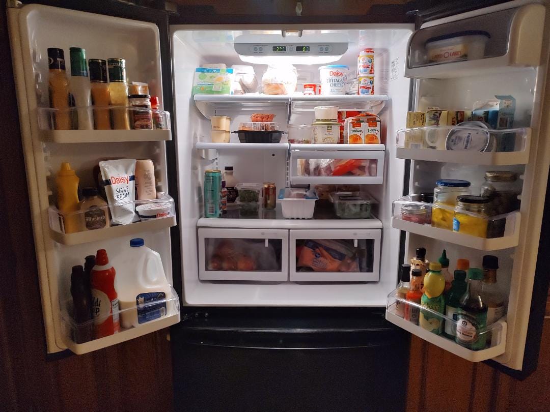 Picture of a clean and organized refrigerator.