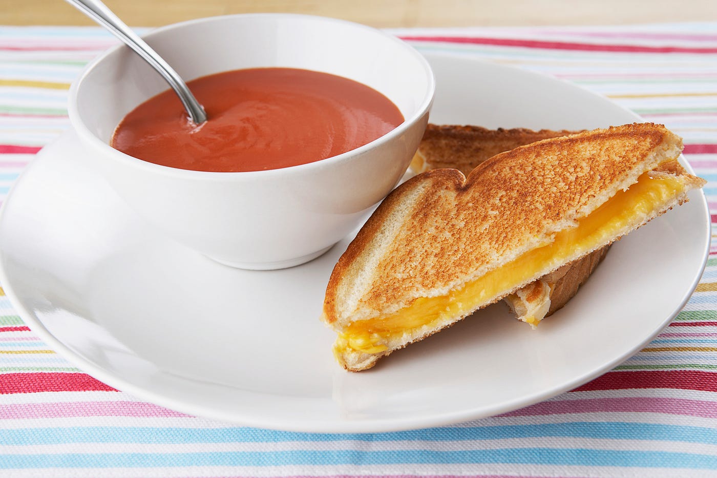 Grilled cheese sandwich and tomato soup.
