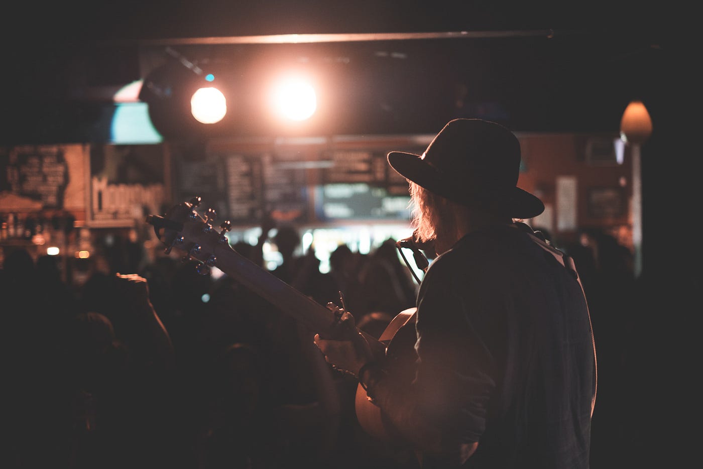 Musician performing in front of live crowd
