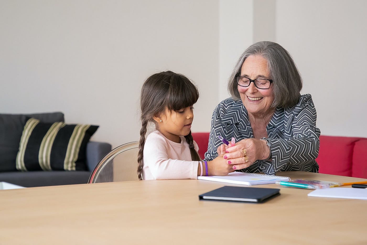grandmother and granddaughter playing