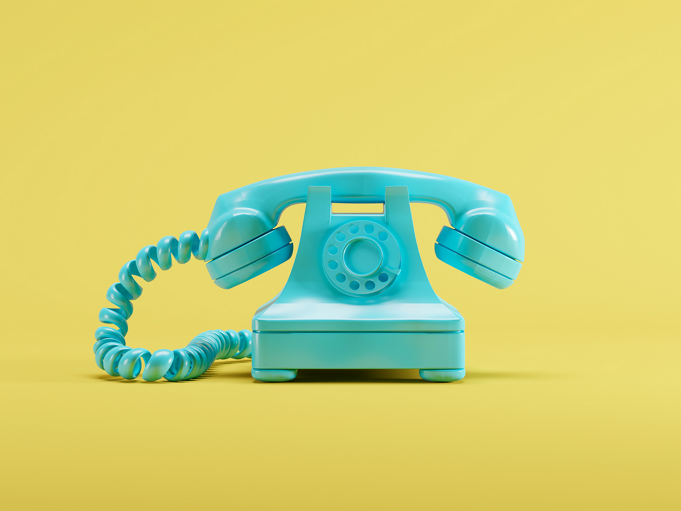 A photo of a teal old-fashioned phone against a yellow background.