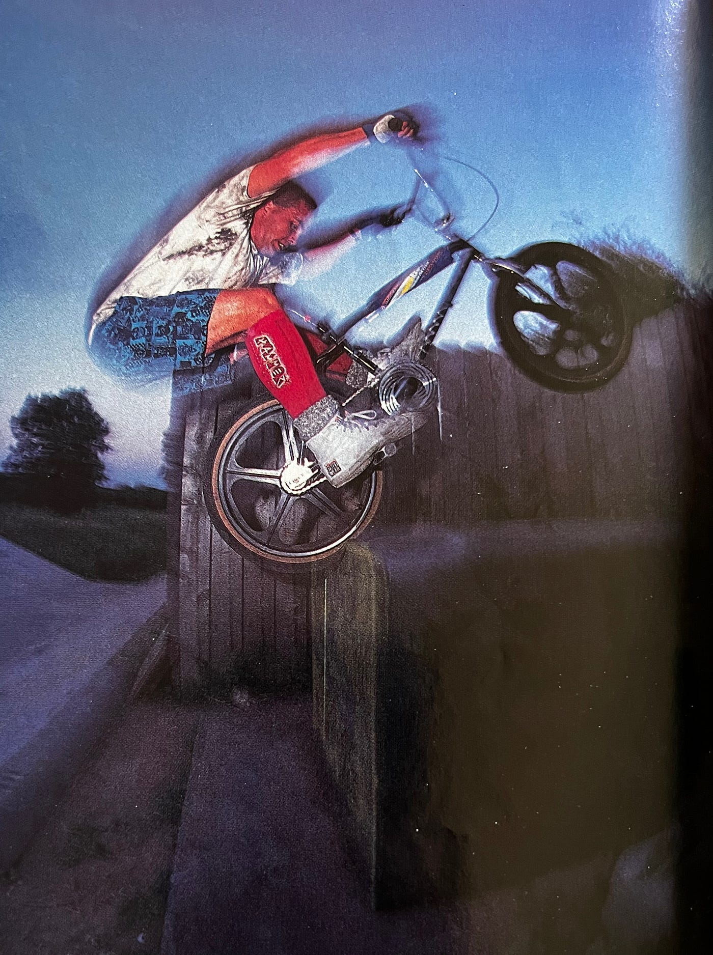 Eddie Roman performing an abubaca stall on a power box at the Lizard Ditch in Austin.