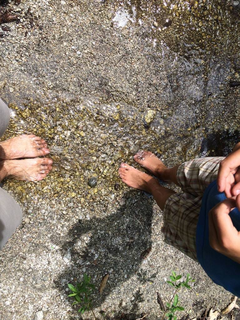 washing off dirty feet