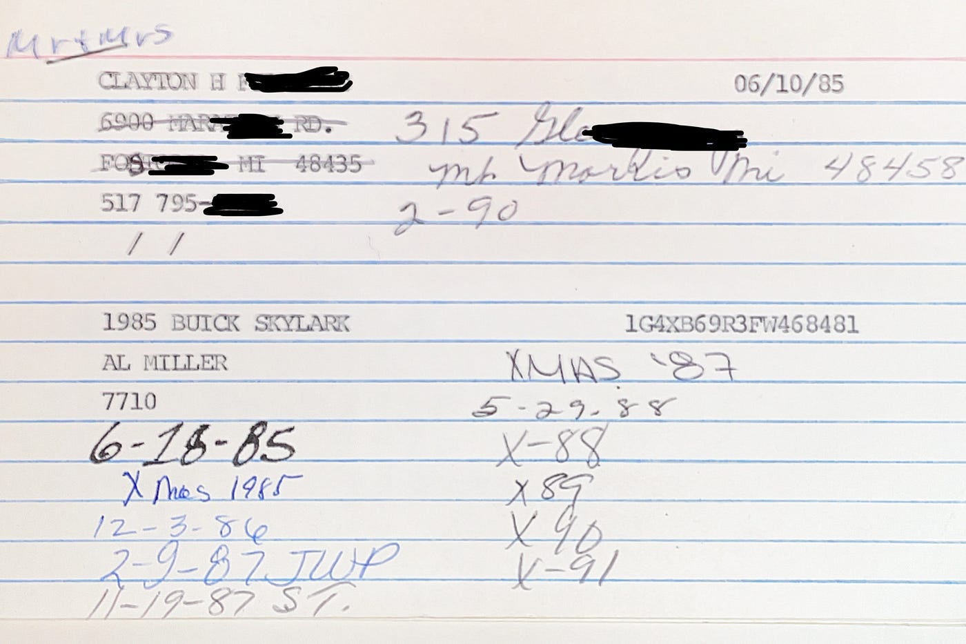 A 3"x5" lined index card filled out with typewritten and handwritten customer information.