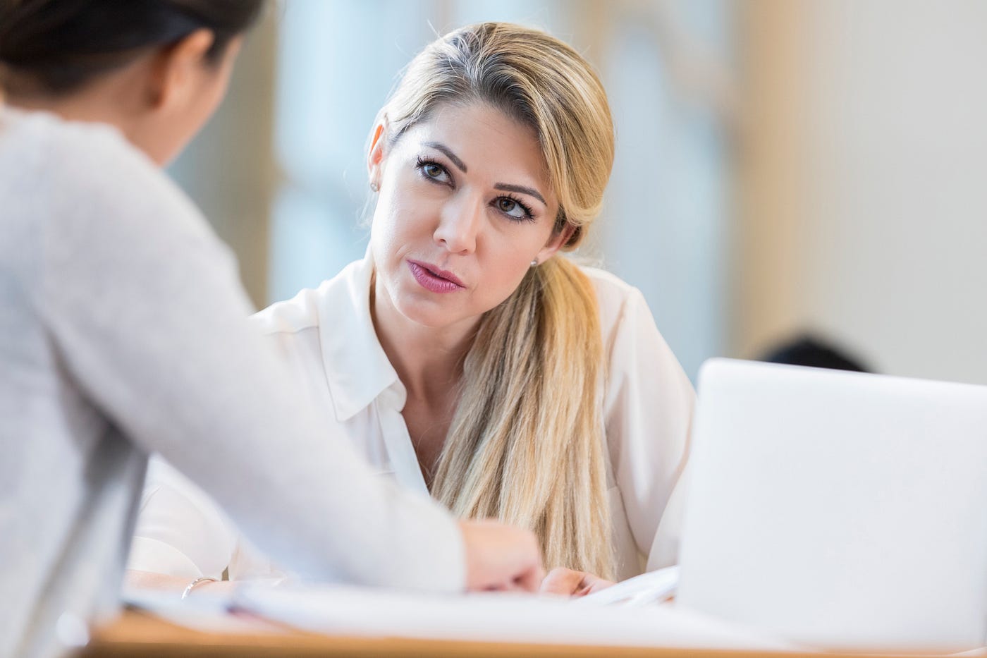 woman listening in an interview