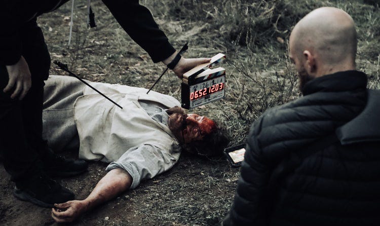 An image of a murder scene being filmed for a TV or movie production.