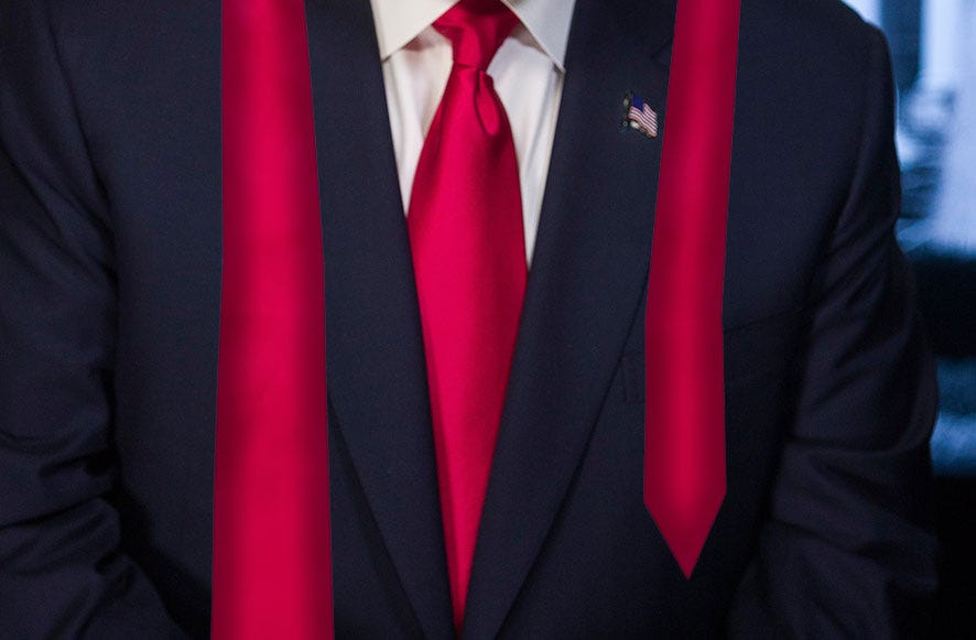 a person in a dark suit with a red tie, and the tie is very long