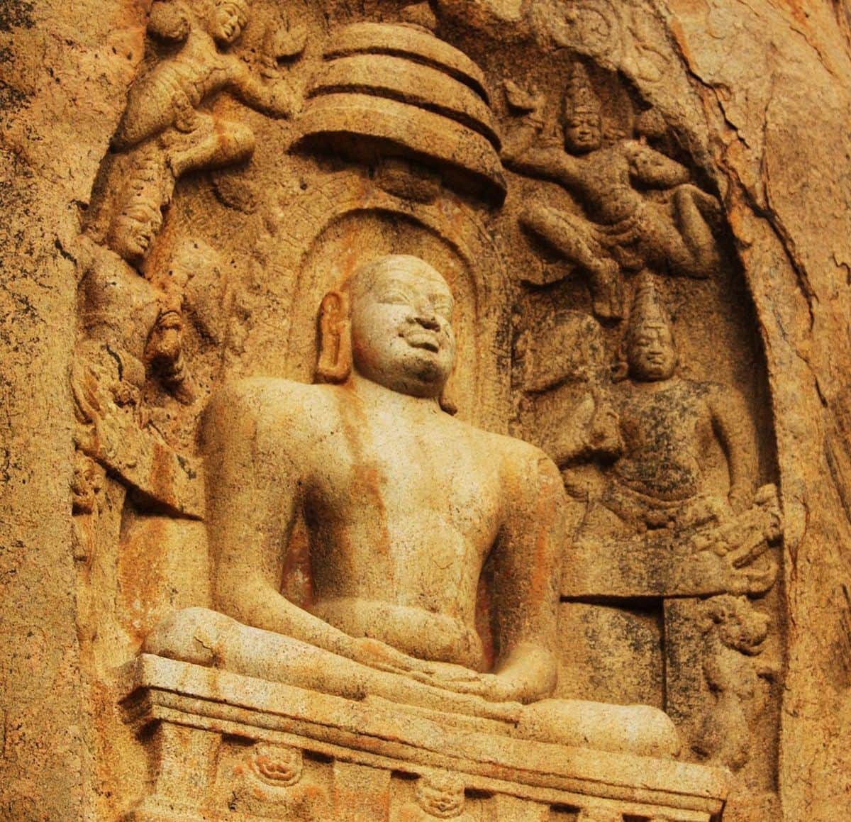 A wall-art showing a man sitting in the meditative posture