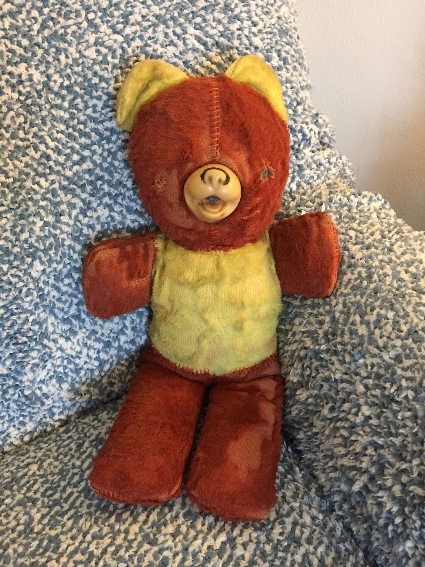 My old Teddy Bear, missing his eyes and obviously well-loved