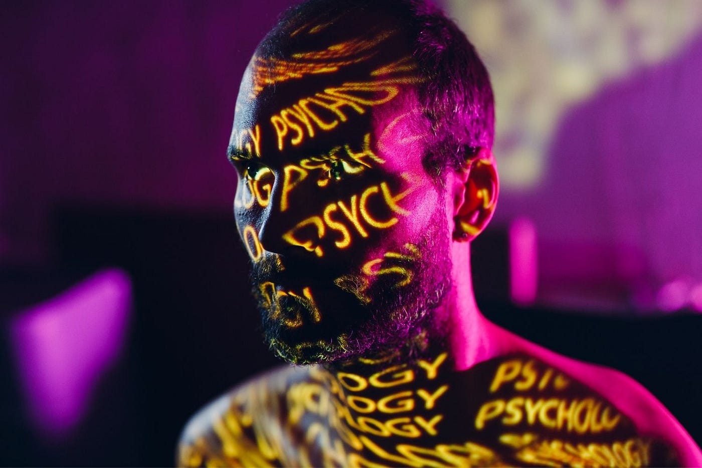 Man with psychology projected over his face and upper body.