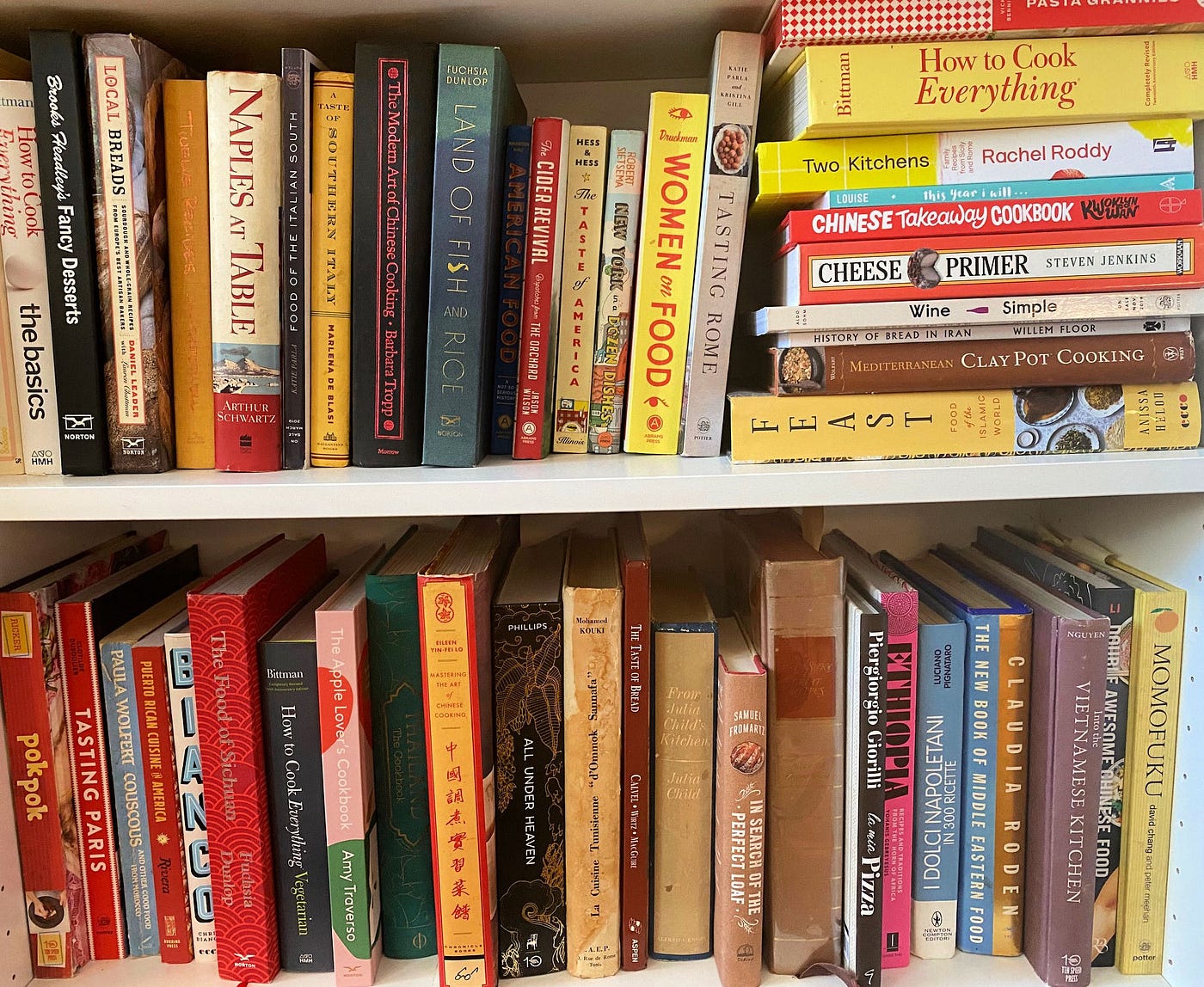 Bookshelves full of cookbooks.
